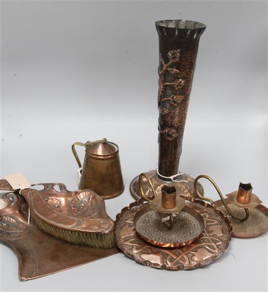 A pair of Arts and Crafts hammered copper and brass chambersticks, stamped IH, a Benson copper lidded pot and five other items